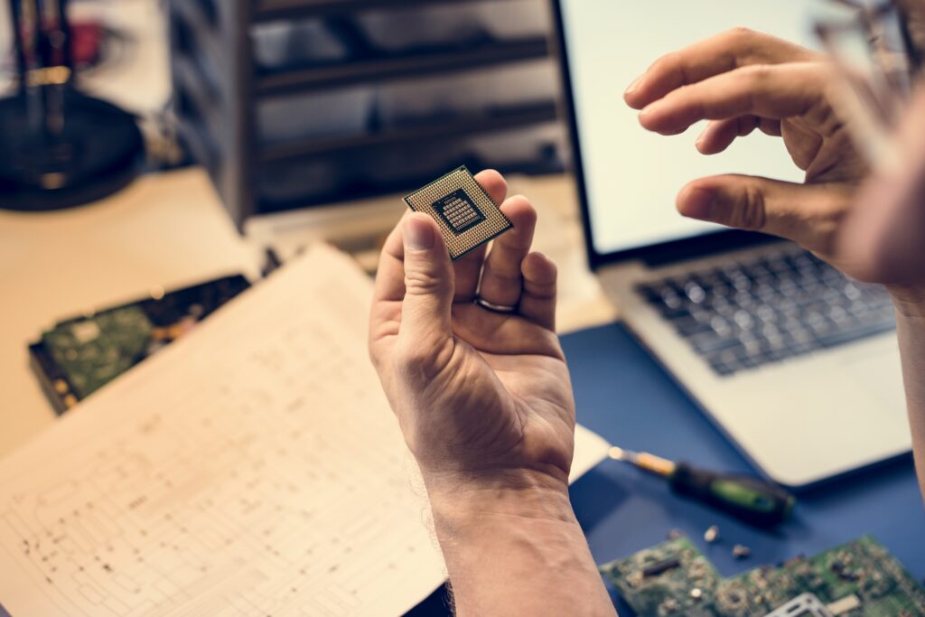 closeup of hands with computer mainboard microproc 2026 01 07 23 38 27 utc